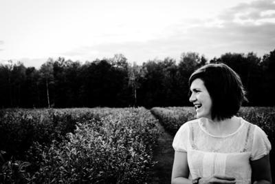 Smiling woman - in field